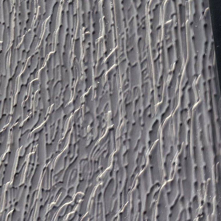 Detalle del relieve: crestas de la textura con luz rasante
